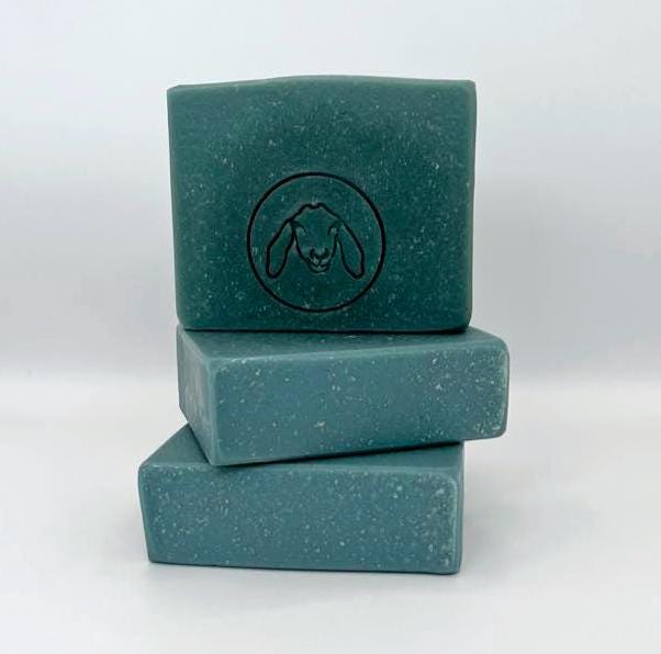 Blue Spruce scented goat milk bar. Blue green in color.